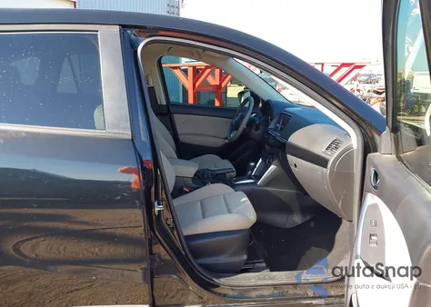 2014 Mazda Cx-5 Touring z USA, uszkodzony, nr VIN JM3KE4CY6E0401599